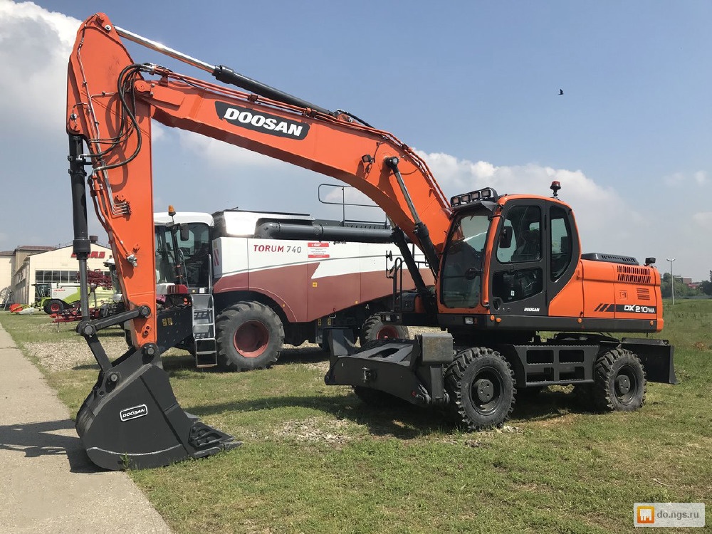 Dx 210. Doosan dx210w. Колесный экскаватор Doosan dx210wa. Экскаватор Дусан dx210w. Дусан 210.